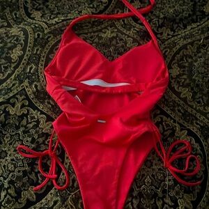 Alphalete one piece swim suit . Never worn before. $35